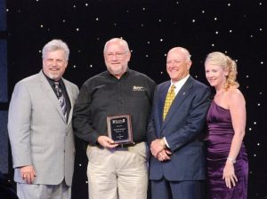 window world beaumont owners accepting award