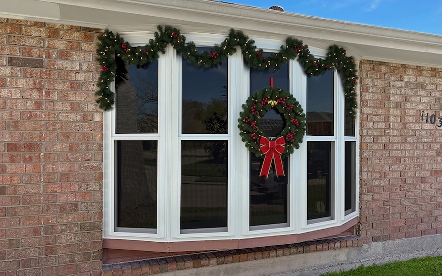 bay window decorated with holiday wreath